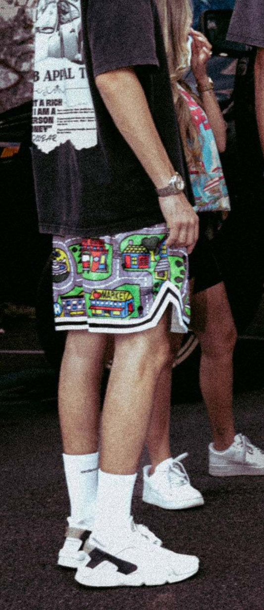 Nostalgia Mesh Shorts featuring colorful car mat-inspired print, modeled in streetwear style.