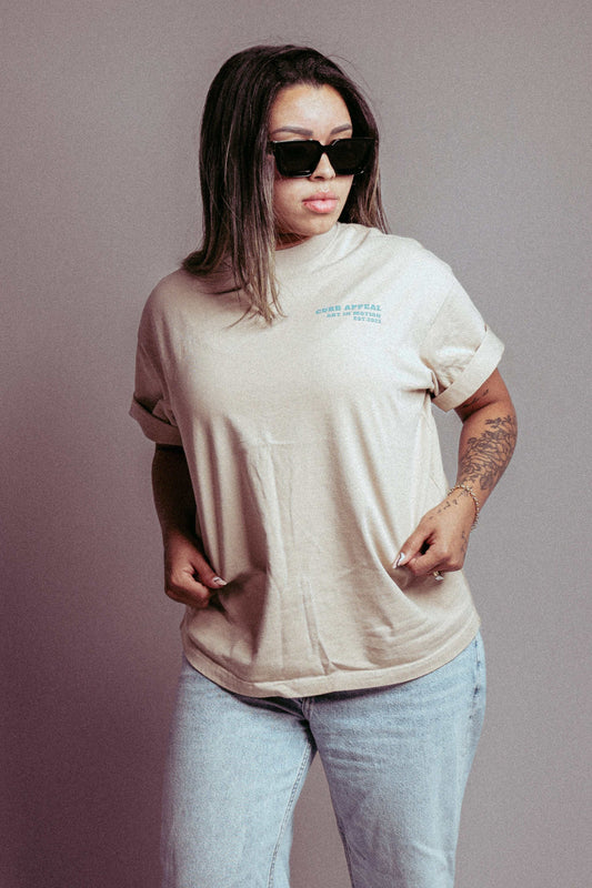 Billion Dollar Man Tee on woman with sunglasses, casual style.