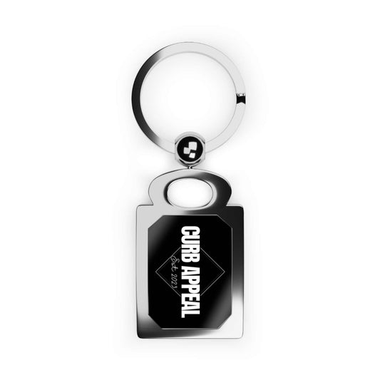 Sleek metallic Logo Keychain with polished "Curb Appeal" design, durable and compact for car enthusiasts.