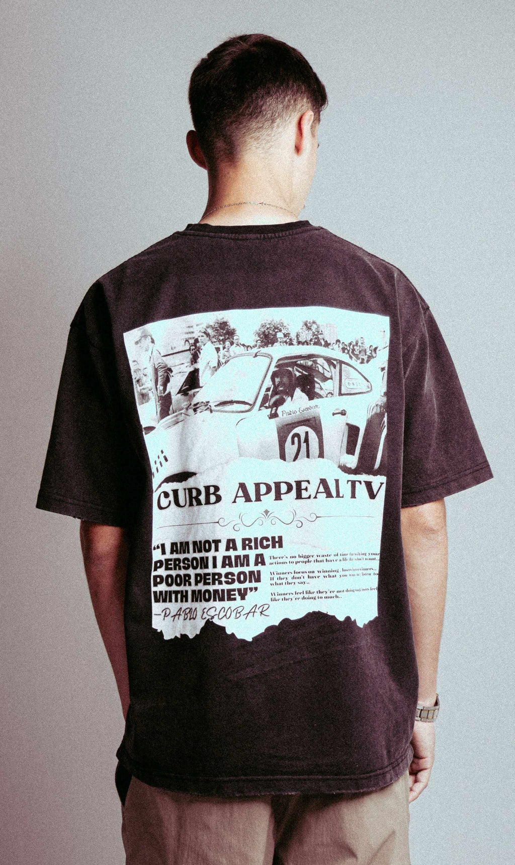 Pablo Racing Tee with vintage car graphic and quote on back.
