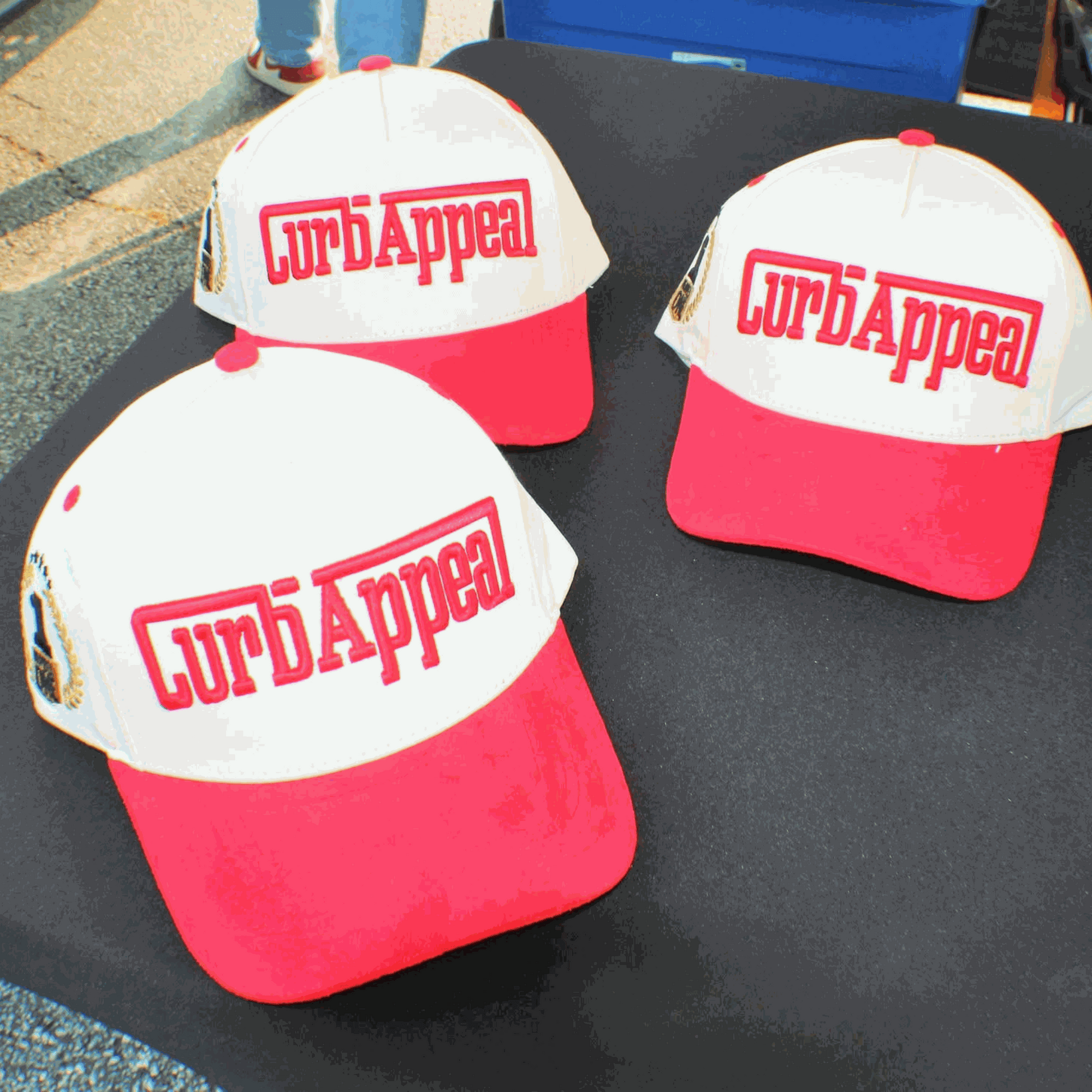 The Winner's Circle Hat with red suede bill and 3D stitching.