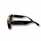 Glossy black High Roller Shades with gold-plated detailing and polarized lenses for UV protection.