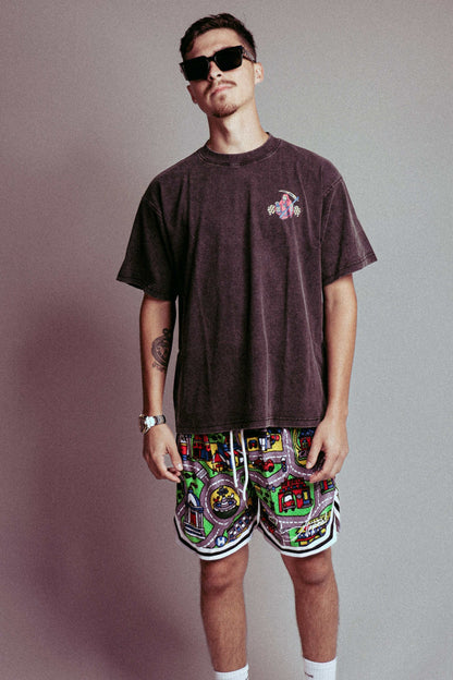Nostalgia Mesh Shorts with classic car mat print, modeled above the knee.