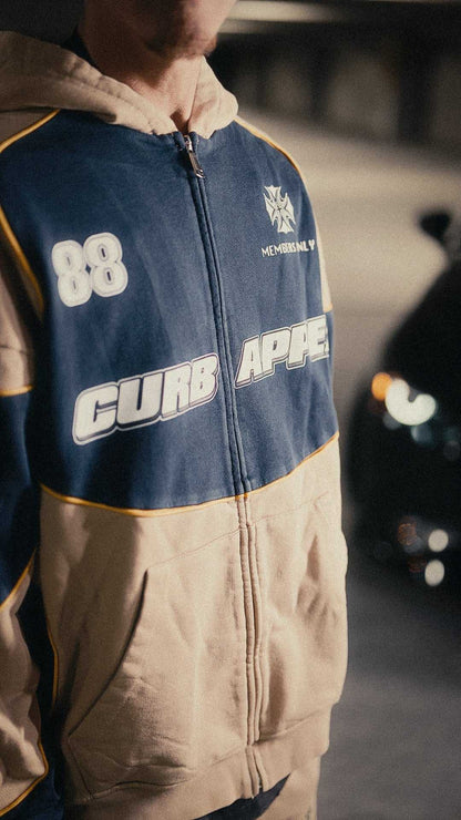 Motorsport track suit set with zip-up hoodie and matching joggers.