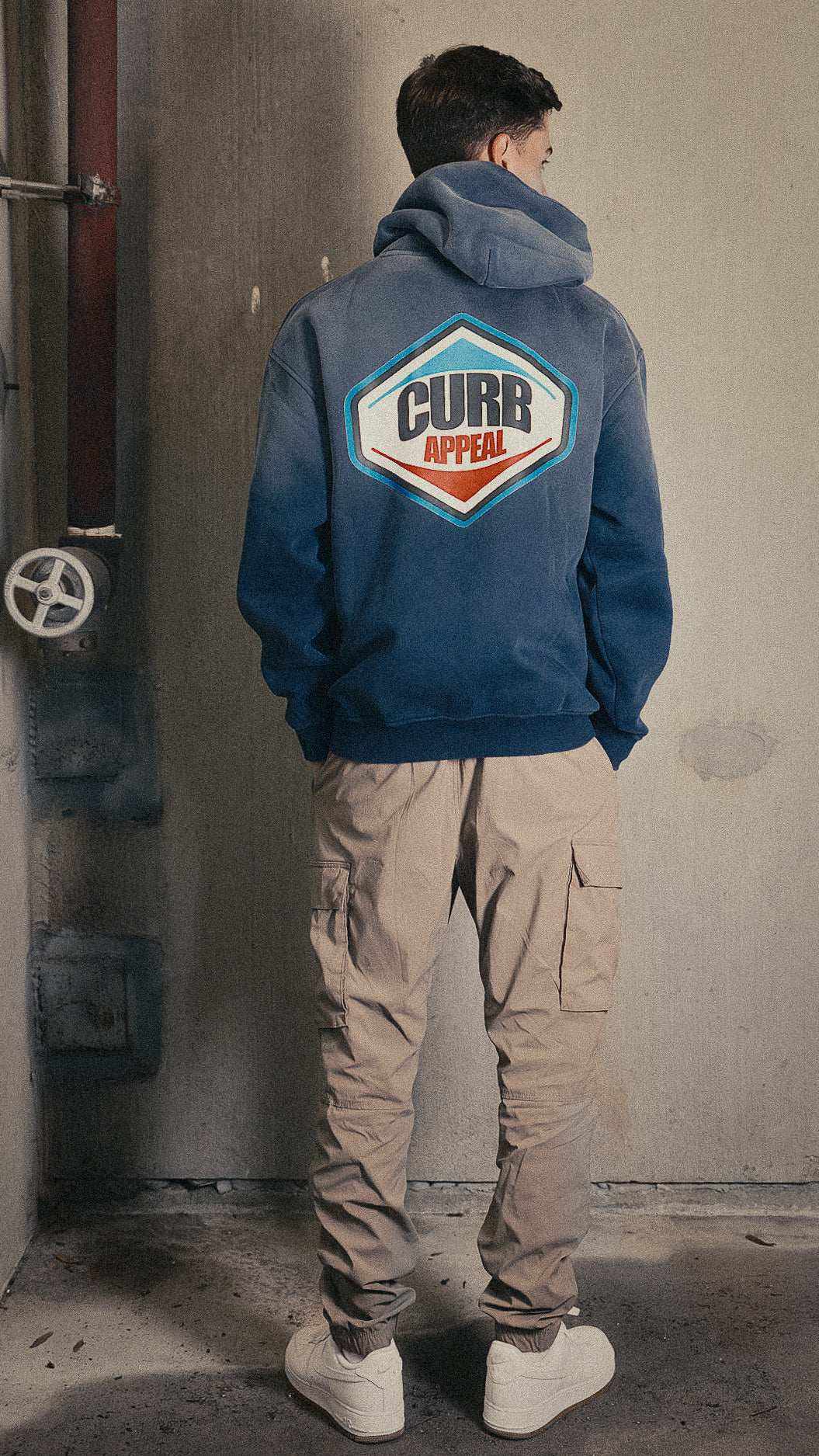 Pit Stop Hoodie with graphic design, featuring loose fit, suitable for casual streetwear in autumn and winter.