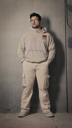 Vintage classic hoodie with oversized fit, acid wash, heavyweight 100% cotton fleece, modeled by a person in casual setting.
