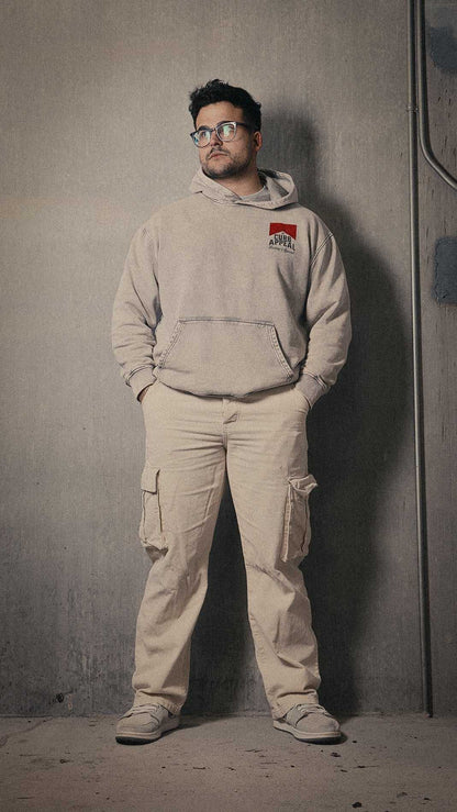 Vintage classic hoodie with oversized fit, acid wash, heavyweight 100% cotton fleece, modeled by a person in casual setting.