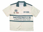 Motion Club Polo with logo patches, cream and green design, cotton-silk blend, short sleeves.