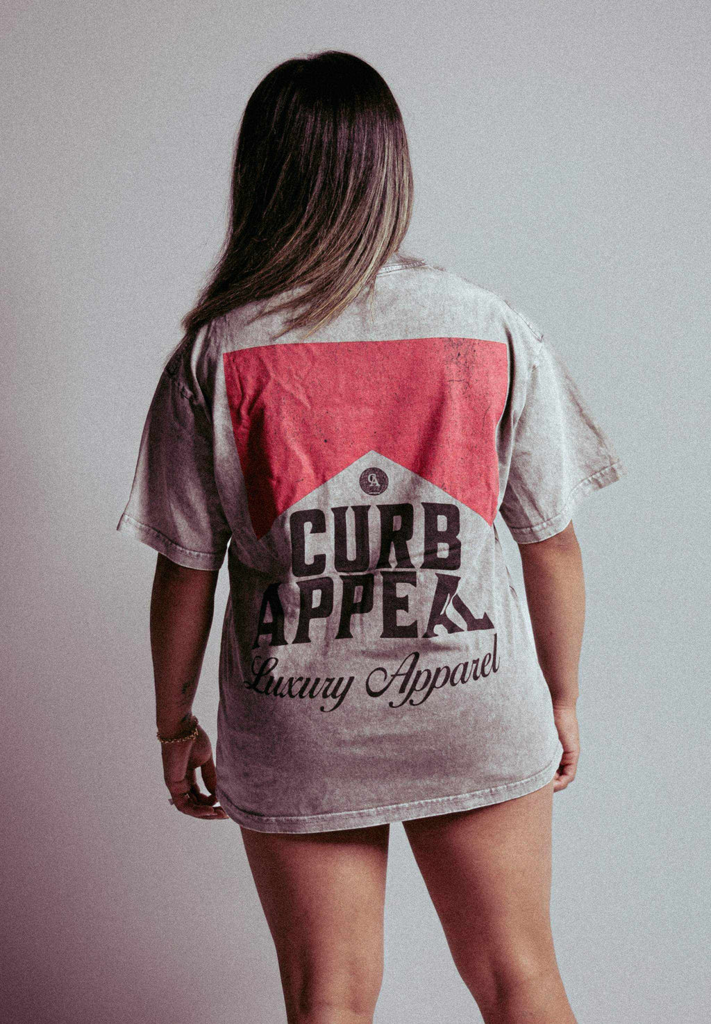 Vintage Classic Tee by Curb Appeal in acid wash style worn by model.