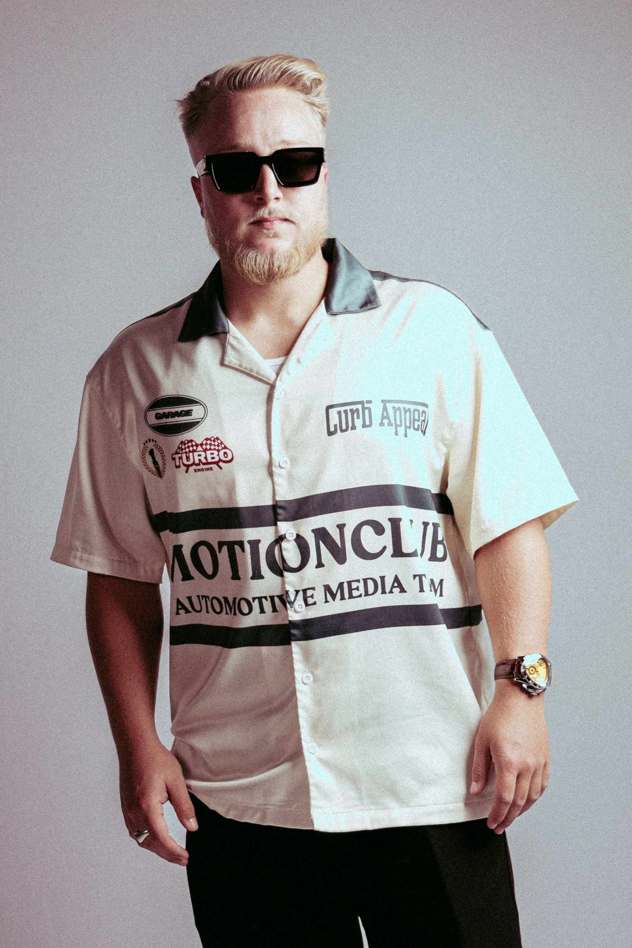 Motion Club Polo cotton-silk blend shirt with automotive-inspired design.