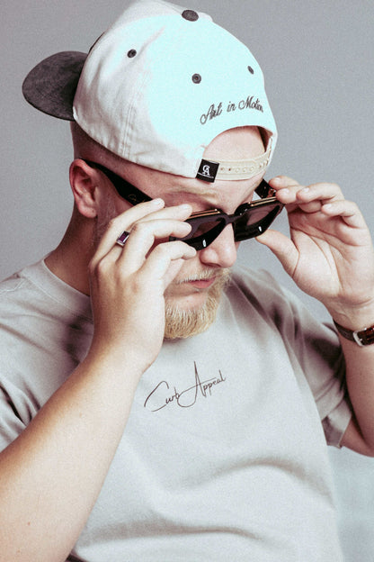 High Roller Shades with polarized lenses and glossy frames being worn.