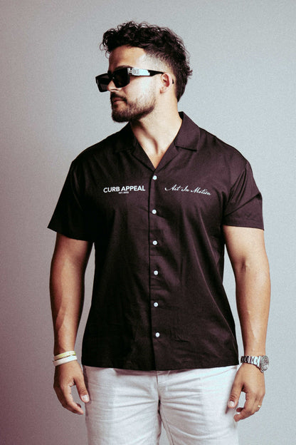 Art In Motion men's button-down shirt, short sleeve, black, casual style.