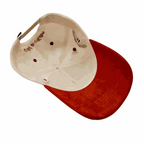 The Winner's Circle Hat with red suede bill and 3D stitching.