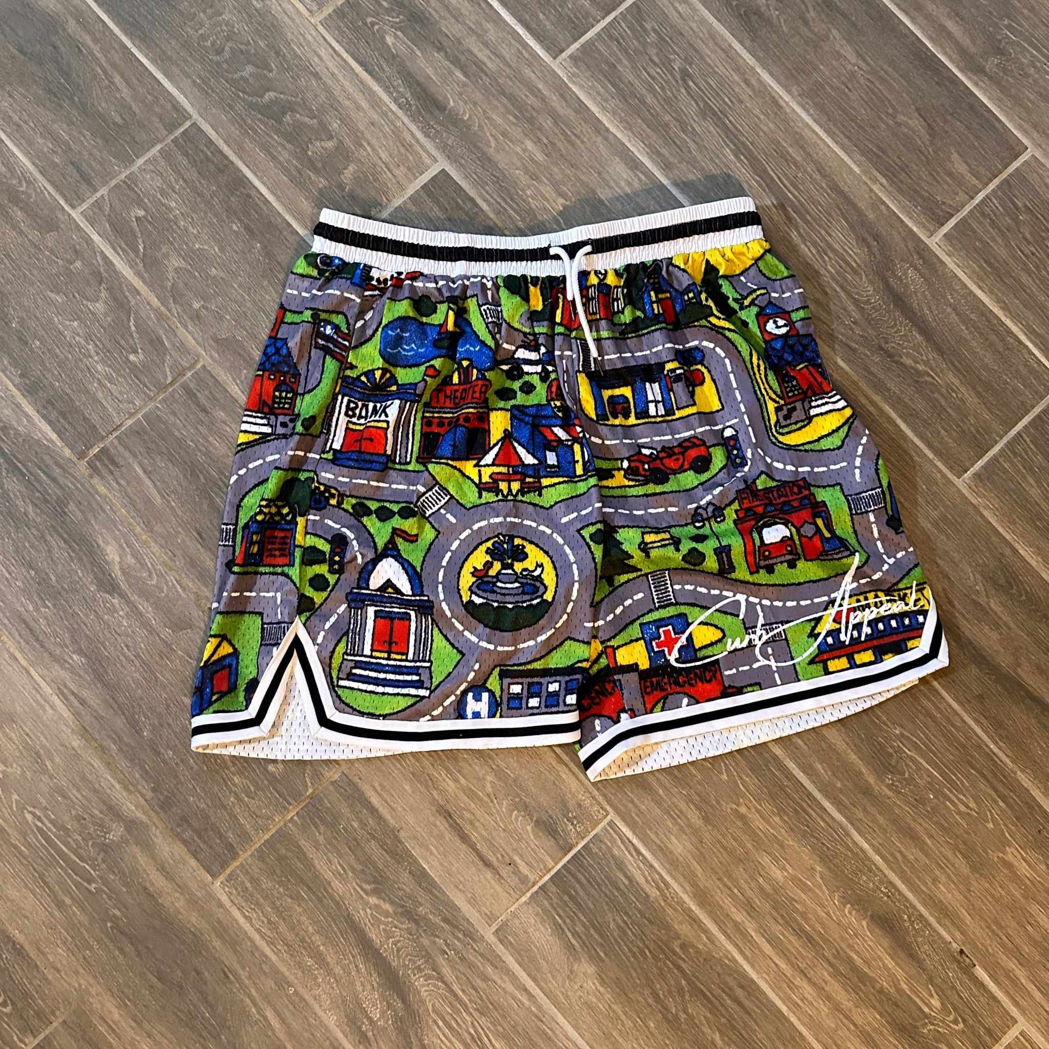Nostalgia mesh shorts with all-over car mat print on wooden floor.